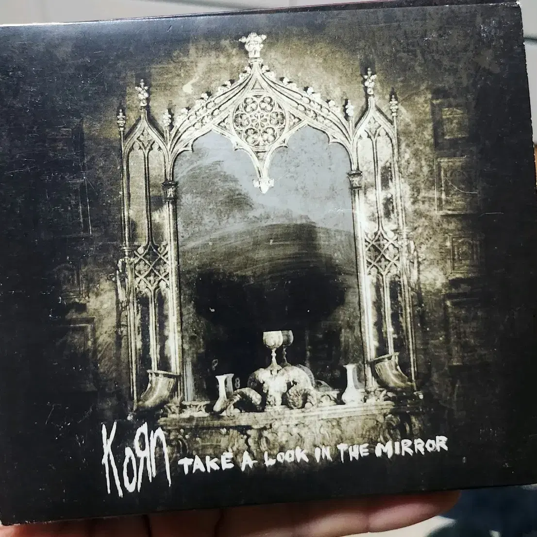 콘 KORN TAKE A LOOK IN THE MIRROR 수입반CD