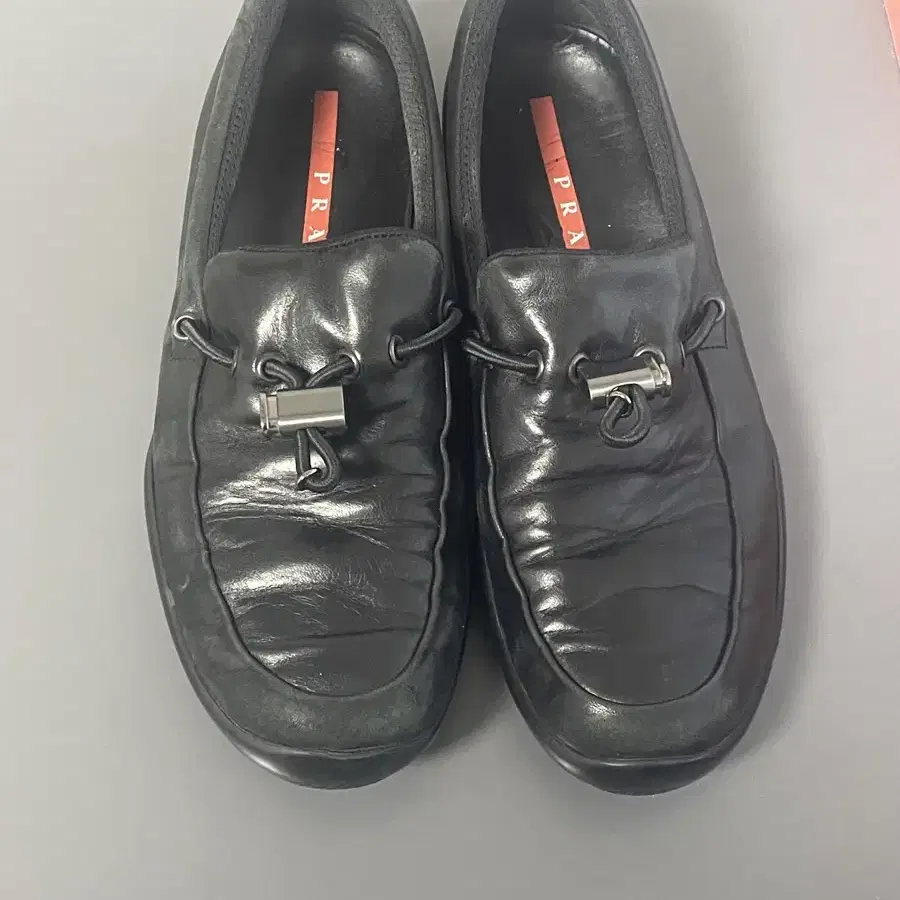 265) prada nappa toggle loafers