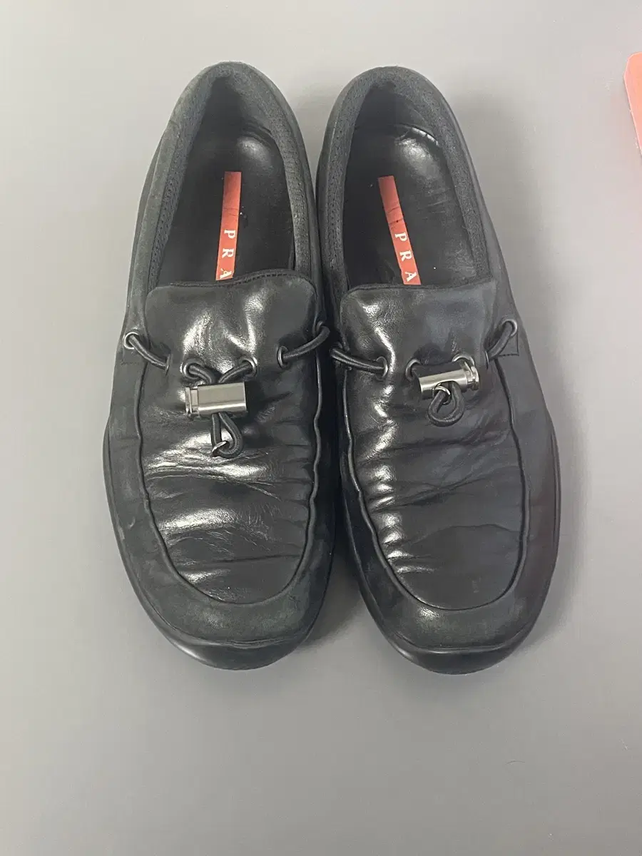 265) prada nappa toggle loafers