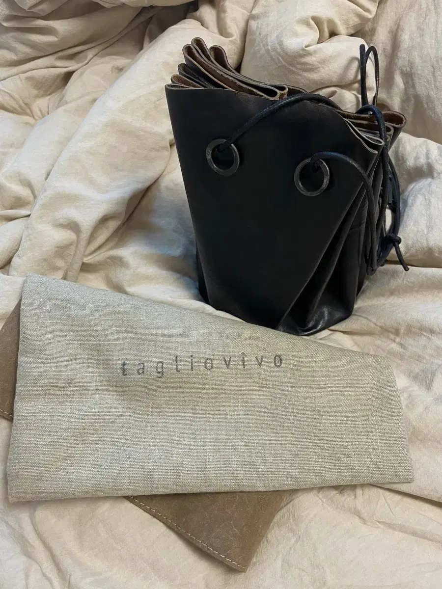 Tagliovivo round bag, casper bag