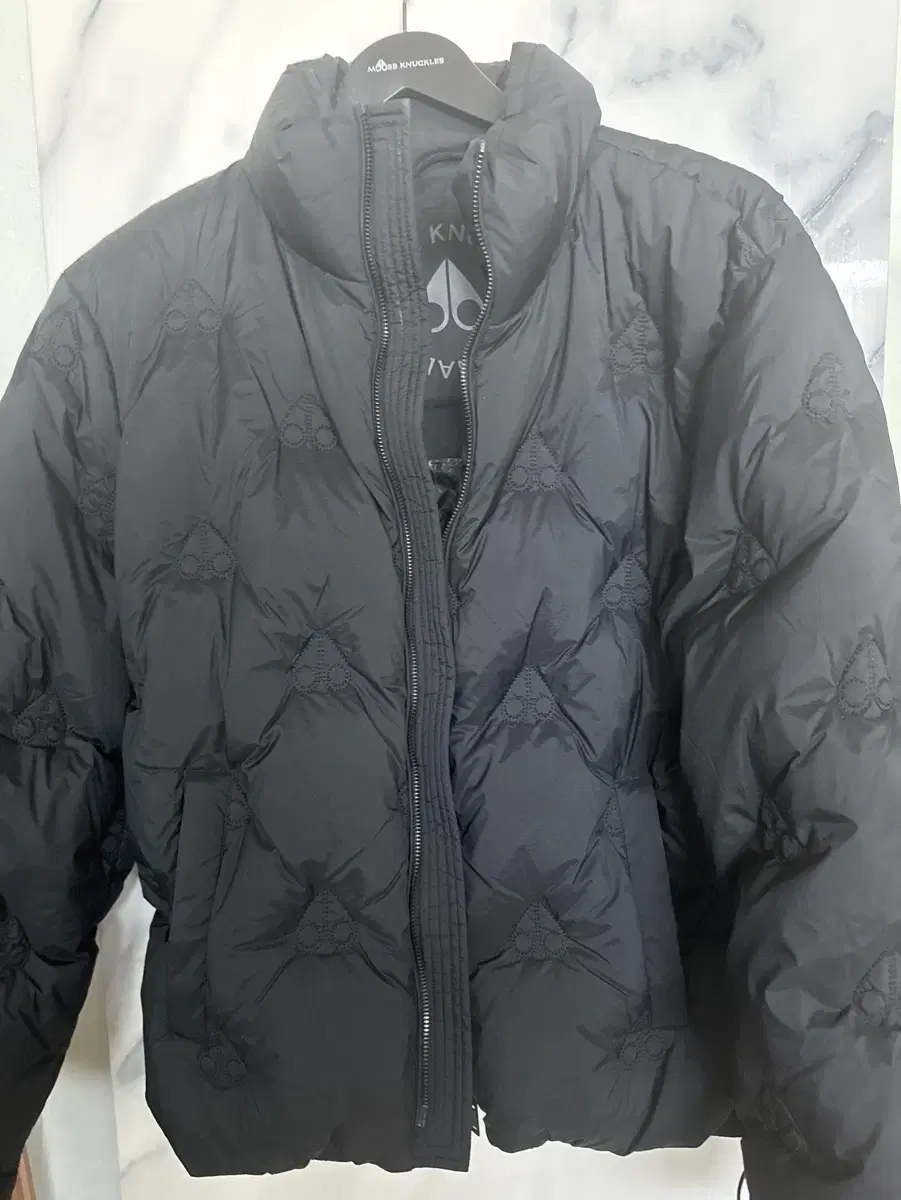 Muscle Knuckle Padding Kings Monogram Puffer Jumper