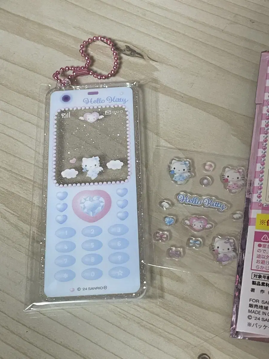 New Products) Sanrio Hello Kitty 50th Anniversary Folders and Feature Phones Mobile Phones acrylic Keyrings