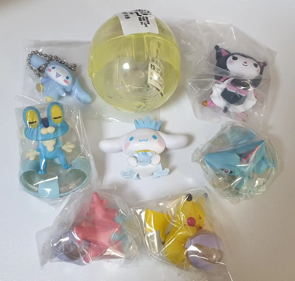 bulk, selling 8 Sanrio Pokemon Gacha figures