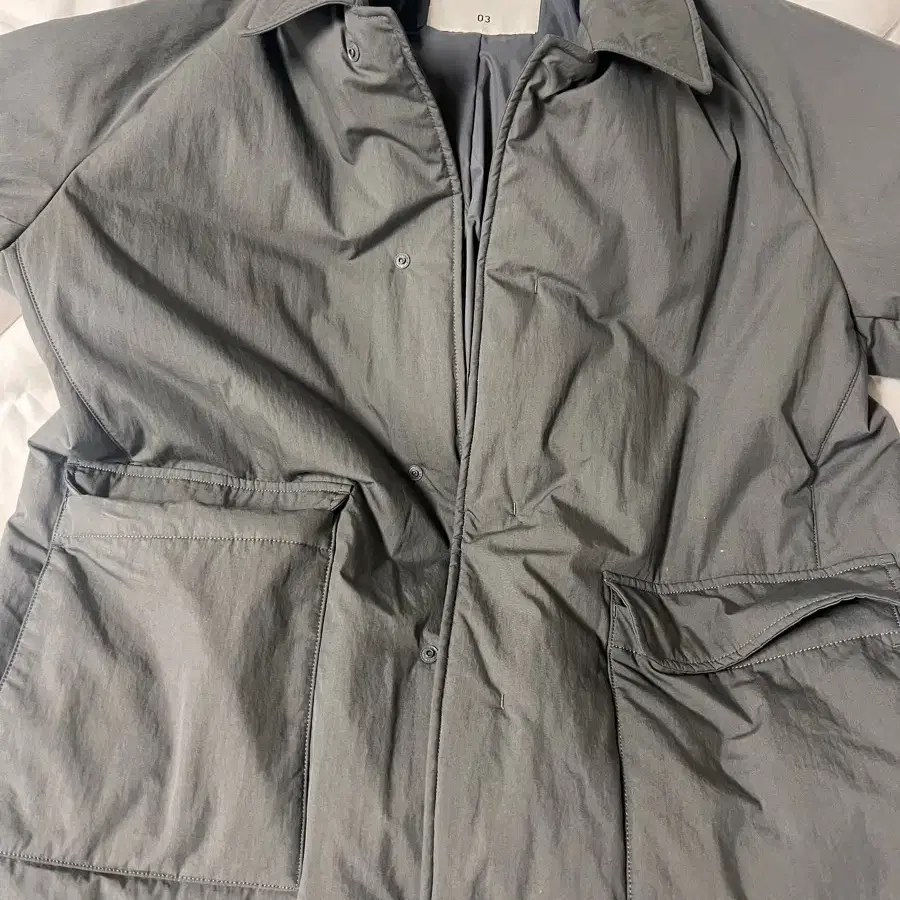 어나더오피스 Voyager Insulation Coat(페퍼콘)