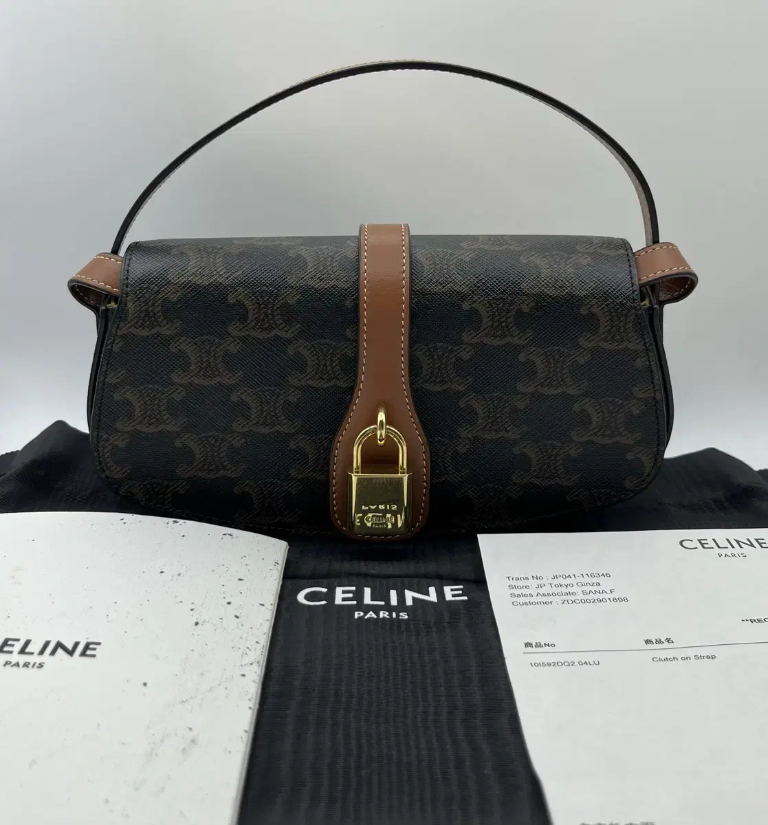 [새상품급]셀린느 타부 스트랩 클러치 트리옹프 캔버스 celine