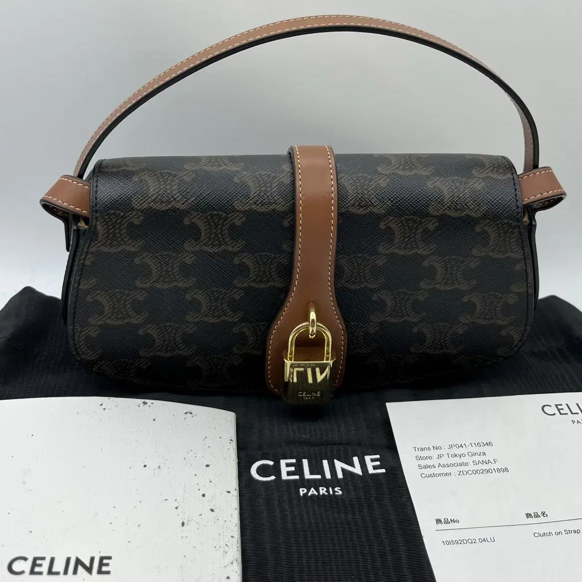 [새상품급]셀린느 타부 스트랩 클러치 트리옹프 캔버스 celine