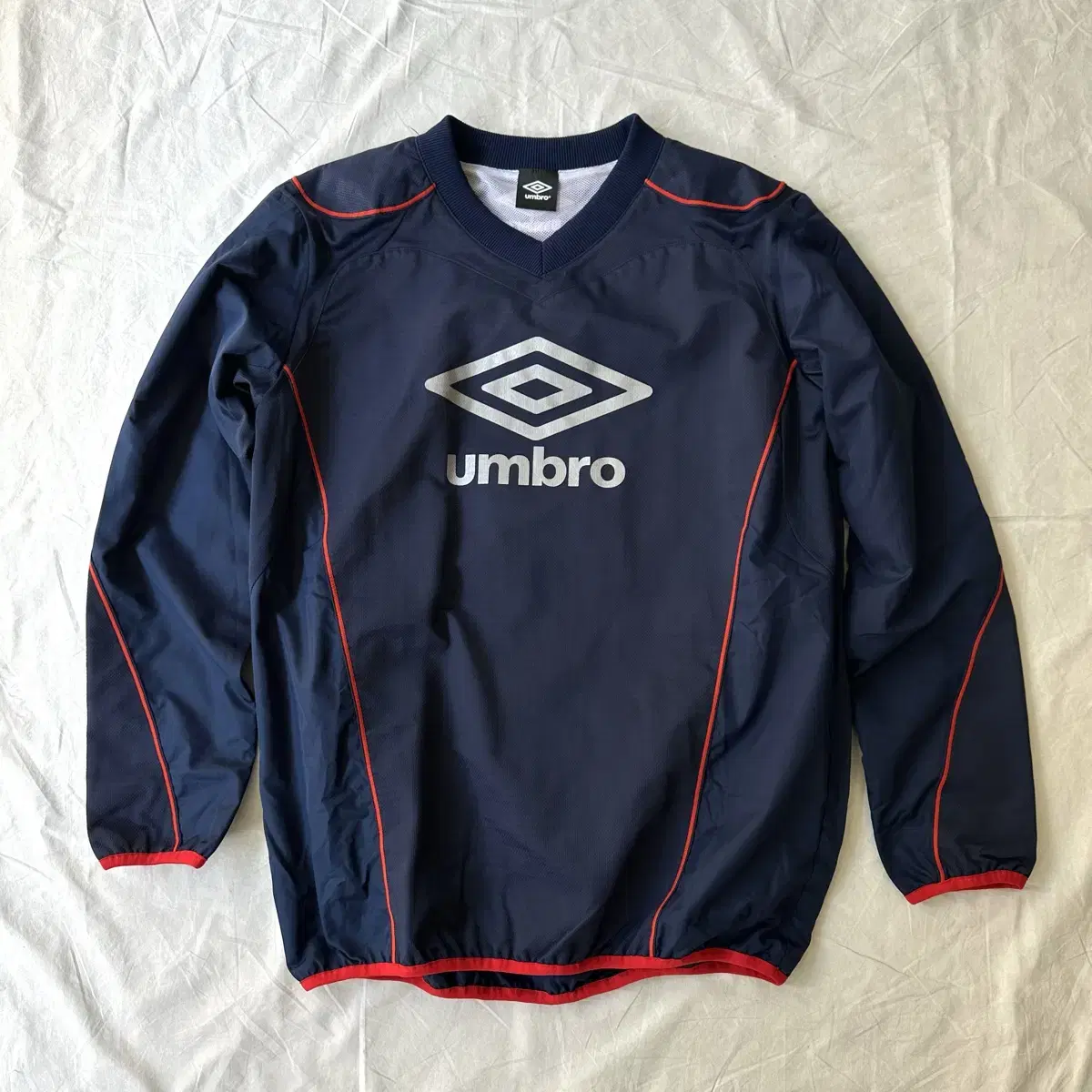 엄브로 umbro 로고 웜업