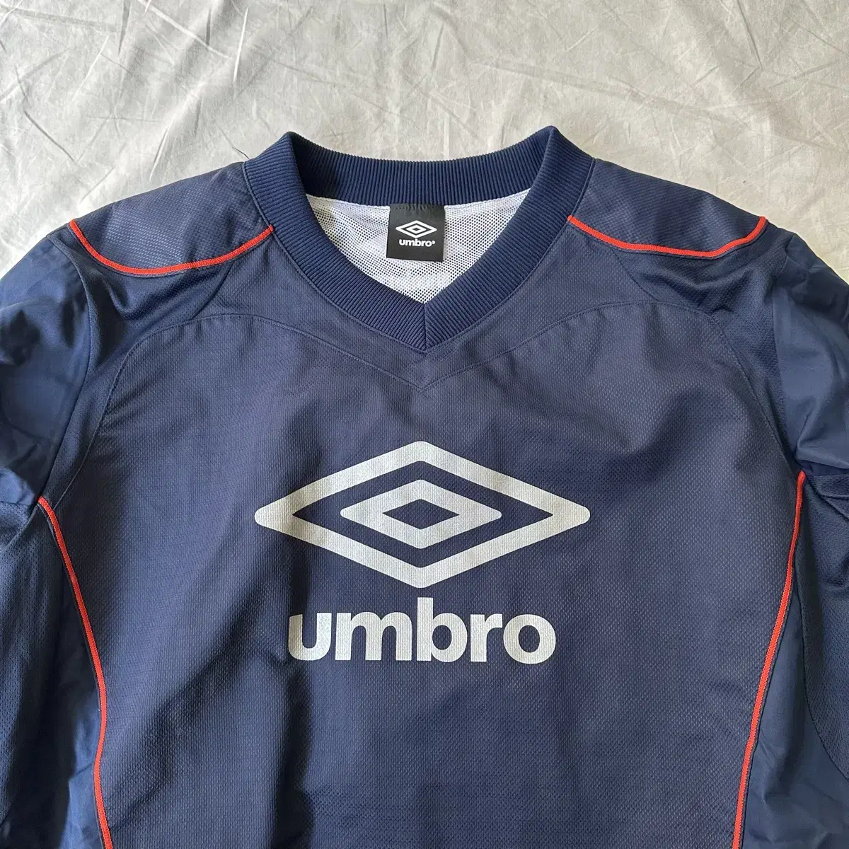 엄브로 umbro 로고 웜업