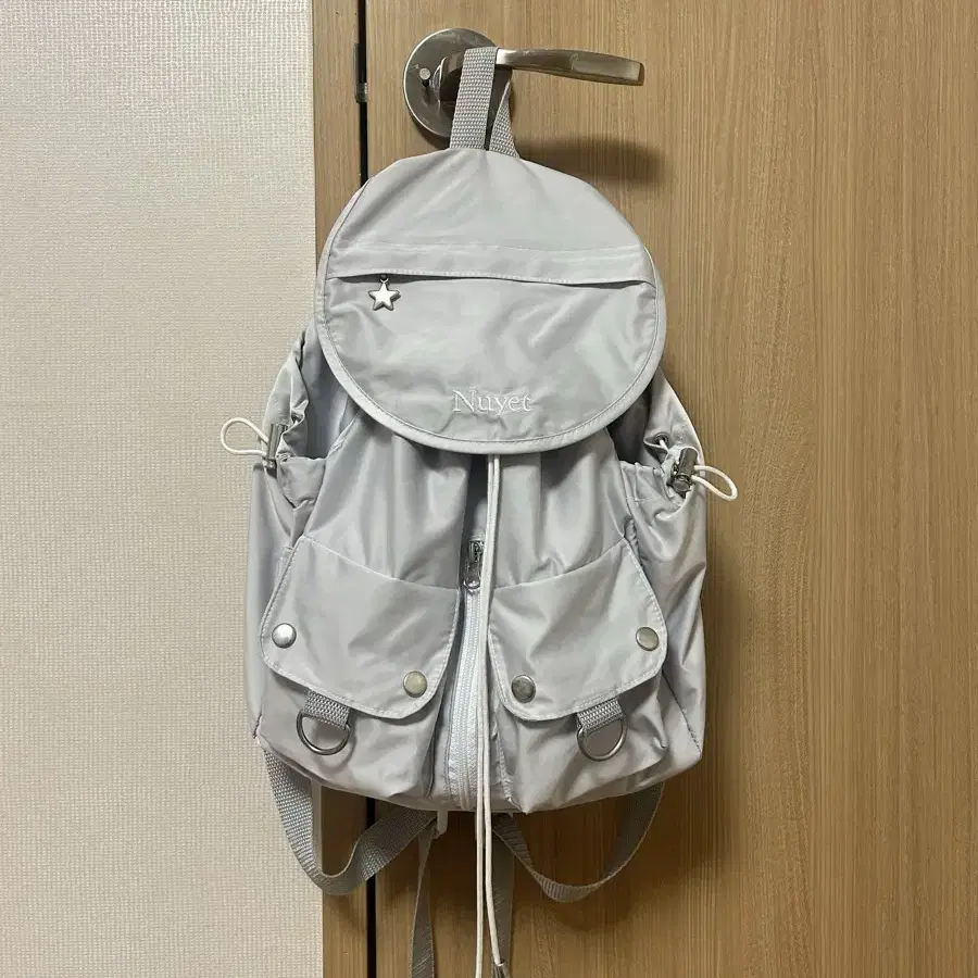 Nuyet grey round pocket backpack