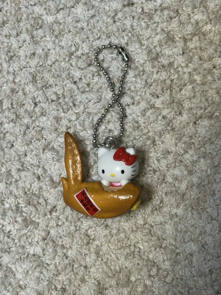 Chicken wing Hello Kitty strap