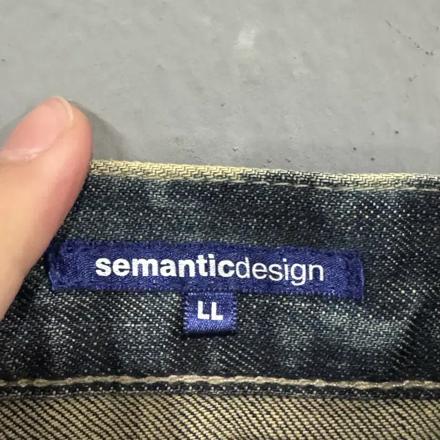 Semantic Designs 워싱 데님 팬츠