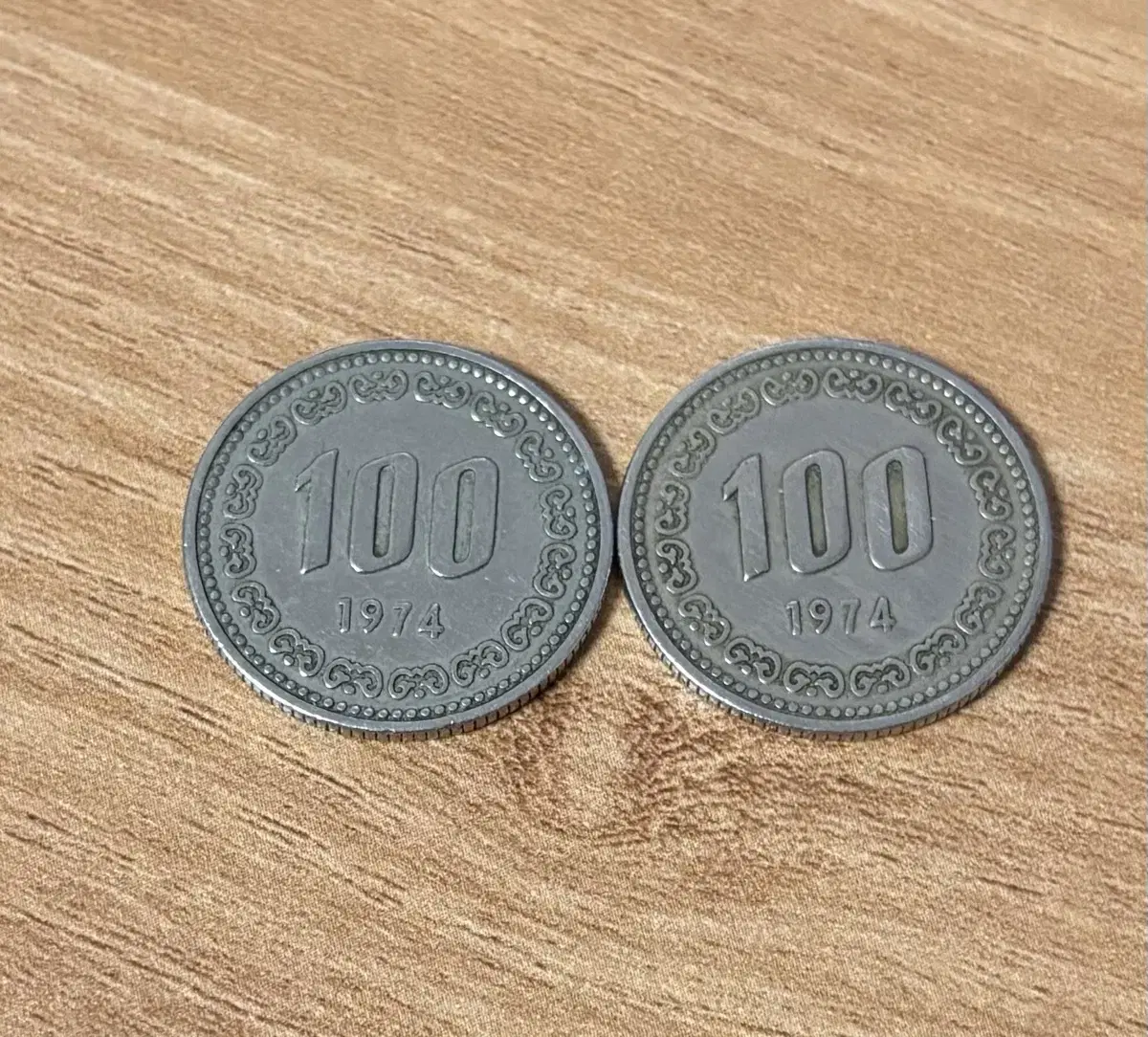 100원 동전 1974