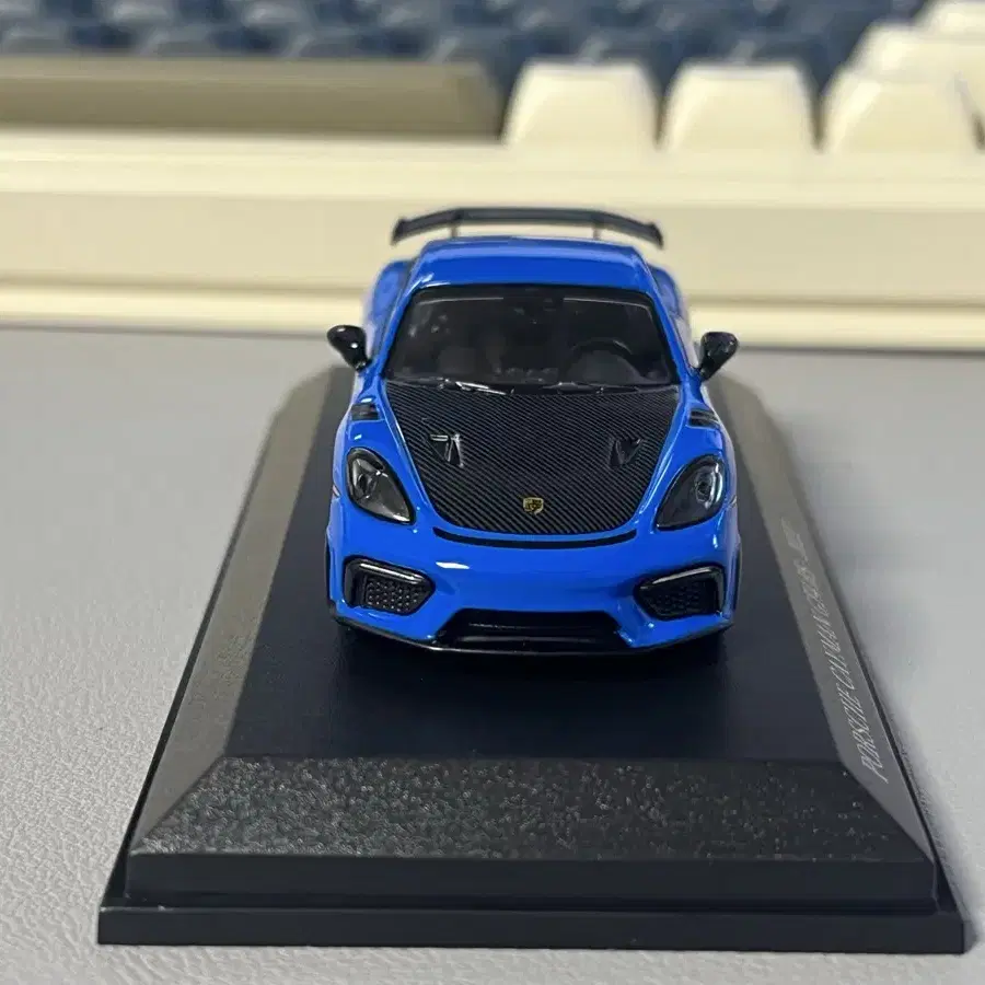 [미니챔프] 1:64 포르쉐 카이맨 gt4rs