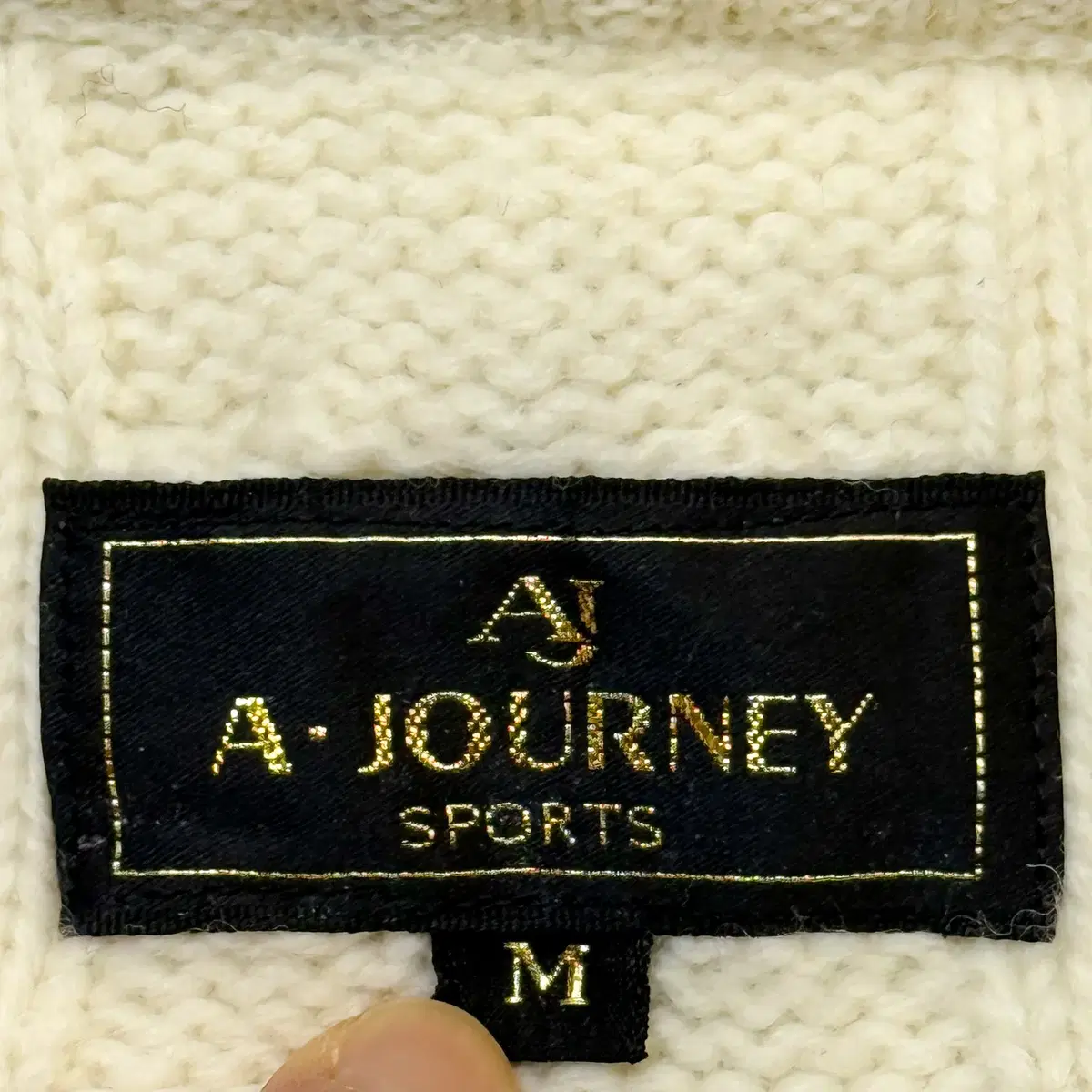 A Journey Sport 파이톤 스네이크 레더 포켓 울 스웨터