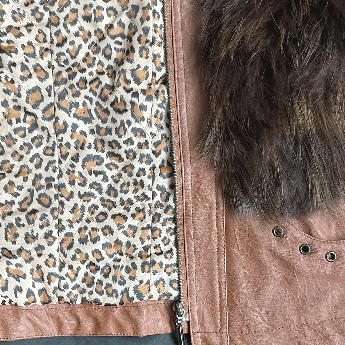 raccoon fur vest