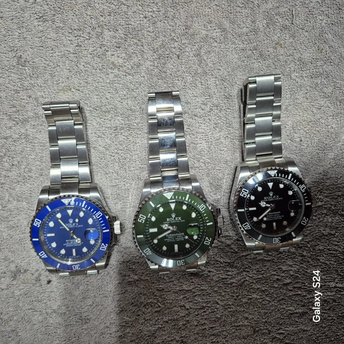 Rolex Submariner. Blue, green, and black dial. New