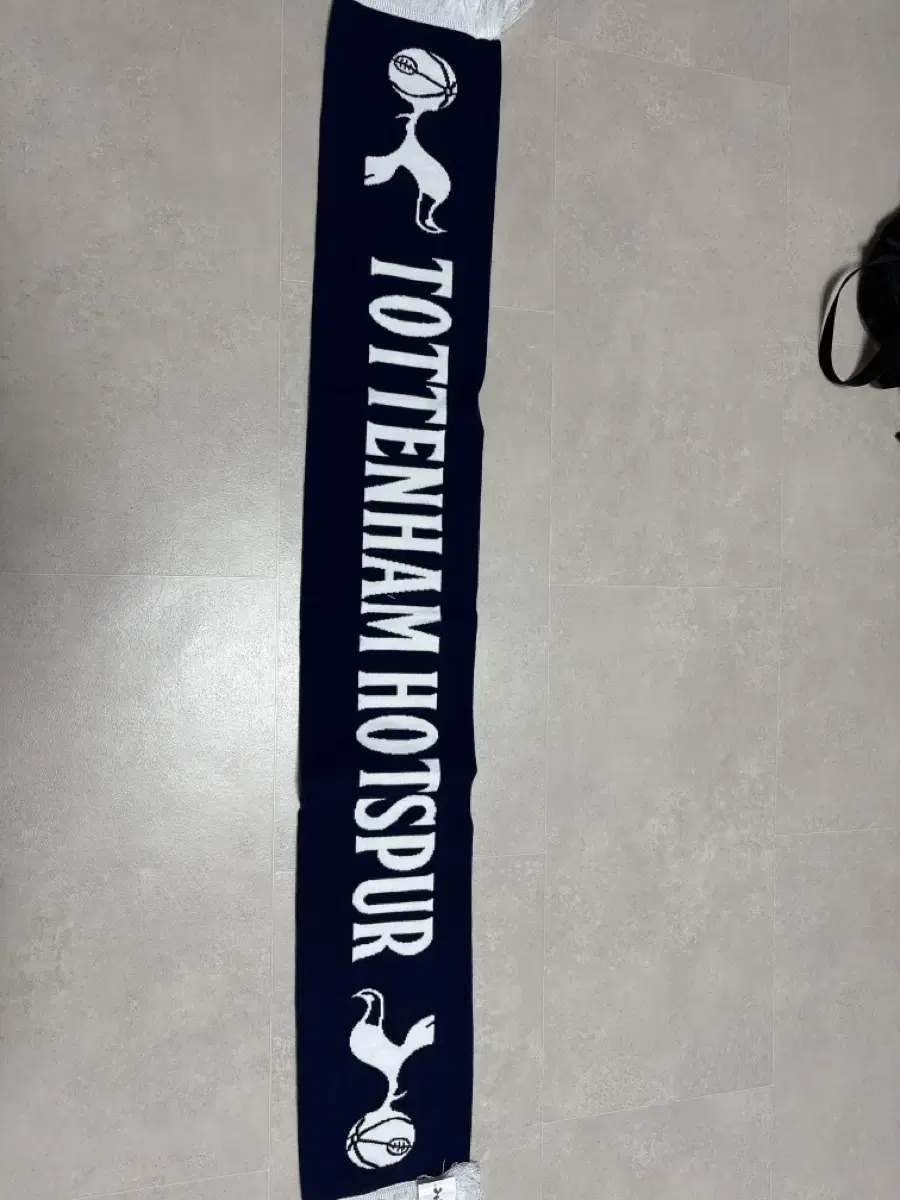 A genuine muffler purchased directly from Tottenham's home stadium