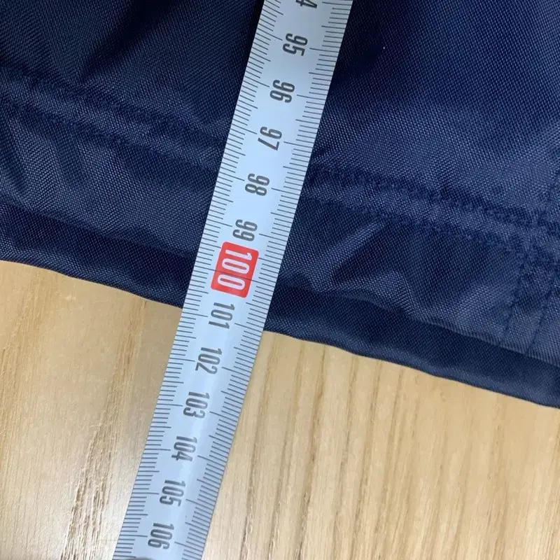 100-105 NIKE 나이키 올드스쿨 롱 돕바 자켓