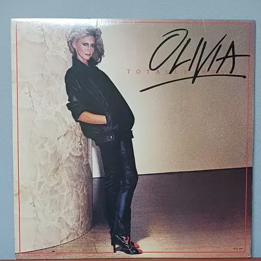 Olivia Newton-John "A Little More Love"