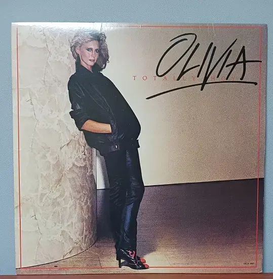 Olivia Newton-John "A Little More Love"