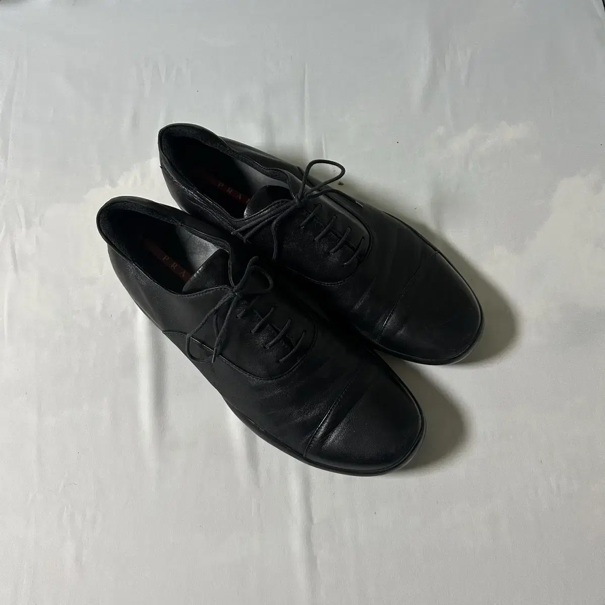 Prada sports cap toe derby shoes