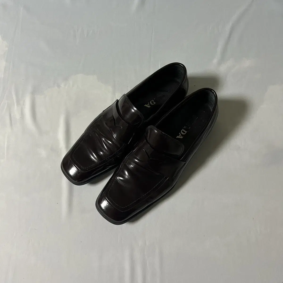 Prada square toe loafers dark brown