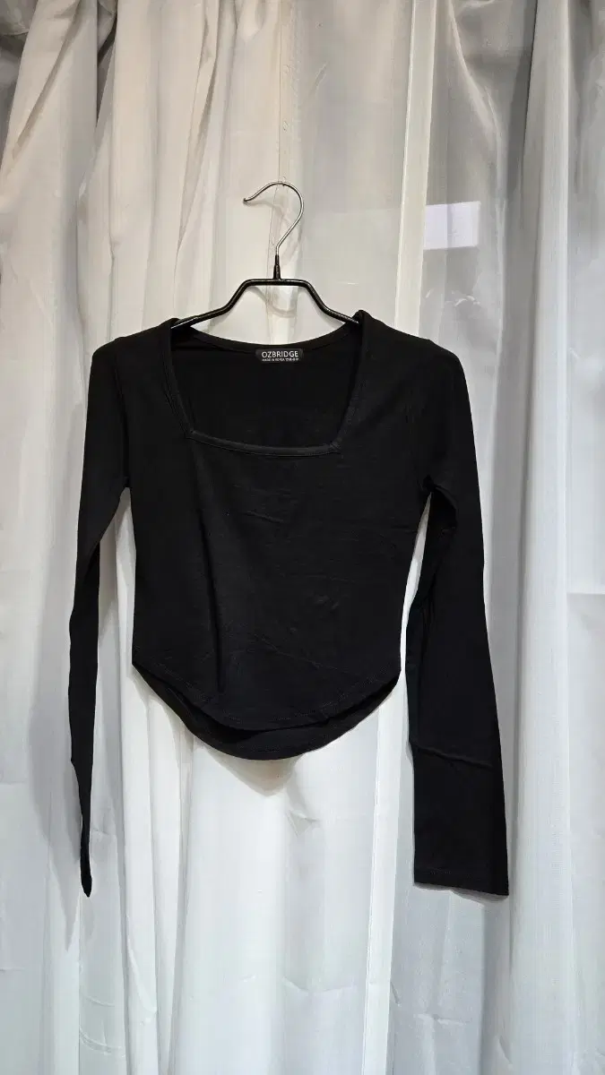 Black hemline, front and back, unfinished square neck, silky cotton, long sleeves