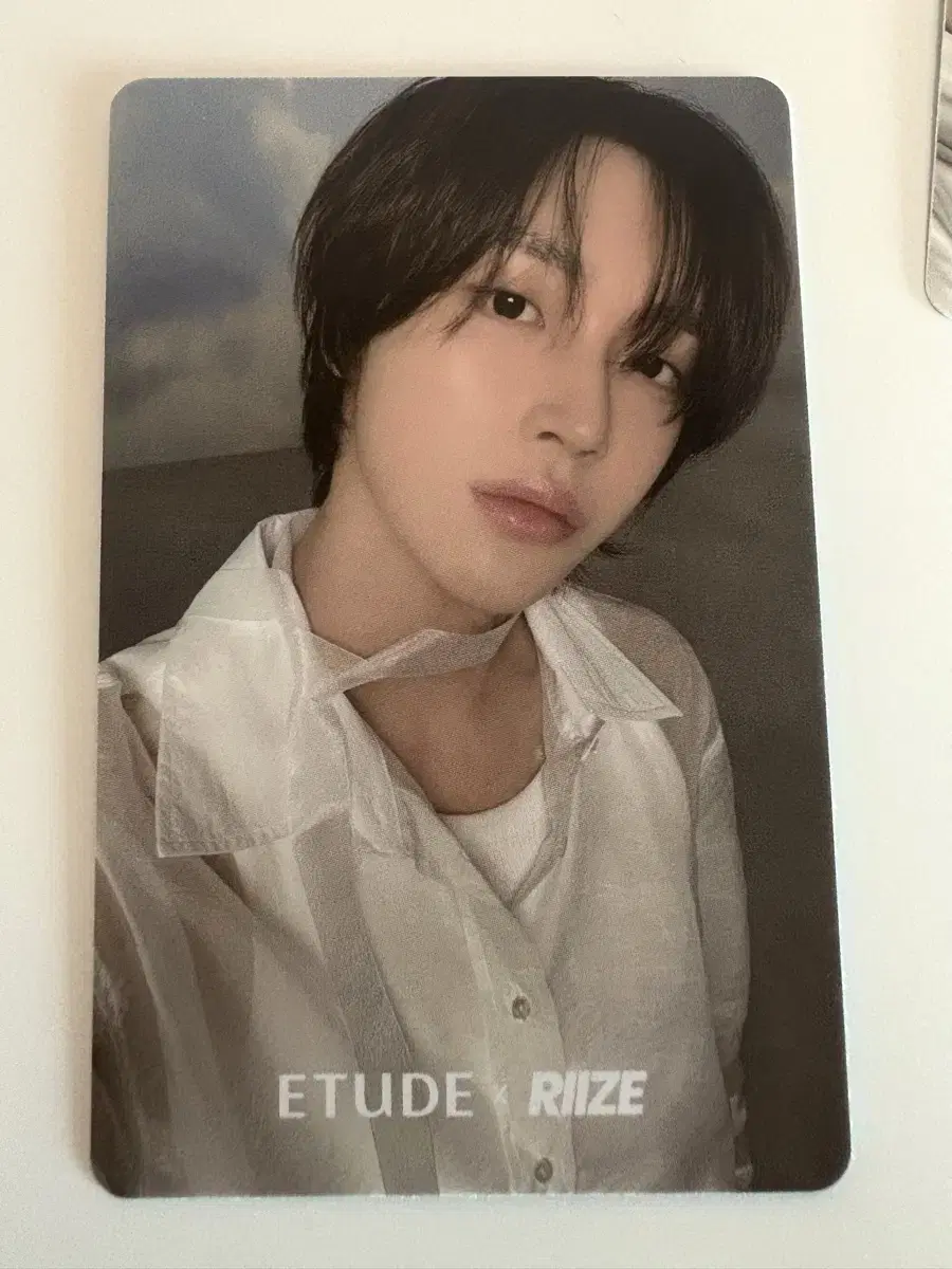 I'm selling a photo card of the Riize X Etude House Cloud Cushion.