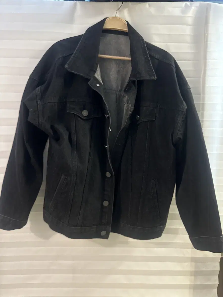 XL black denim jacket that looks big