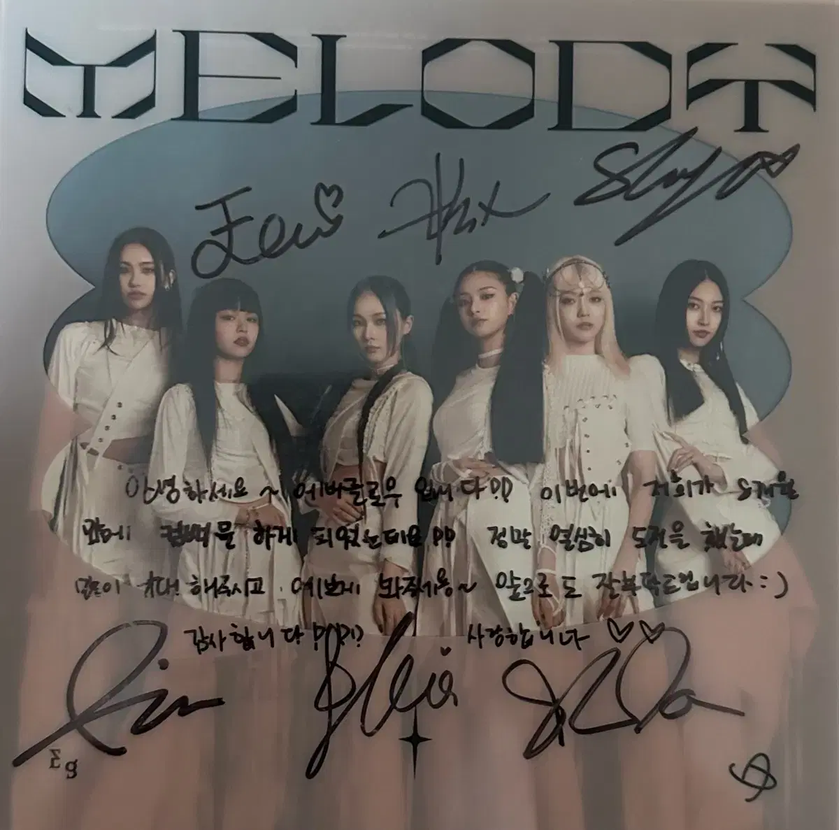 Everglow autographed album + handwritten message