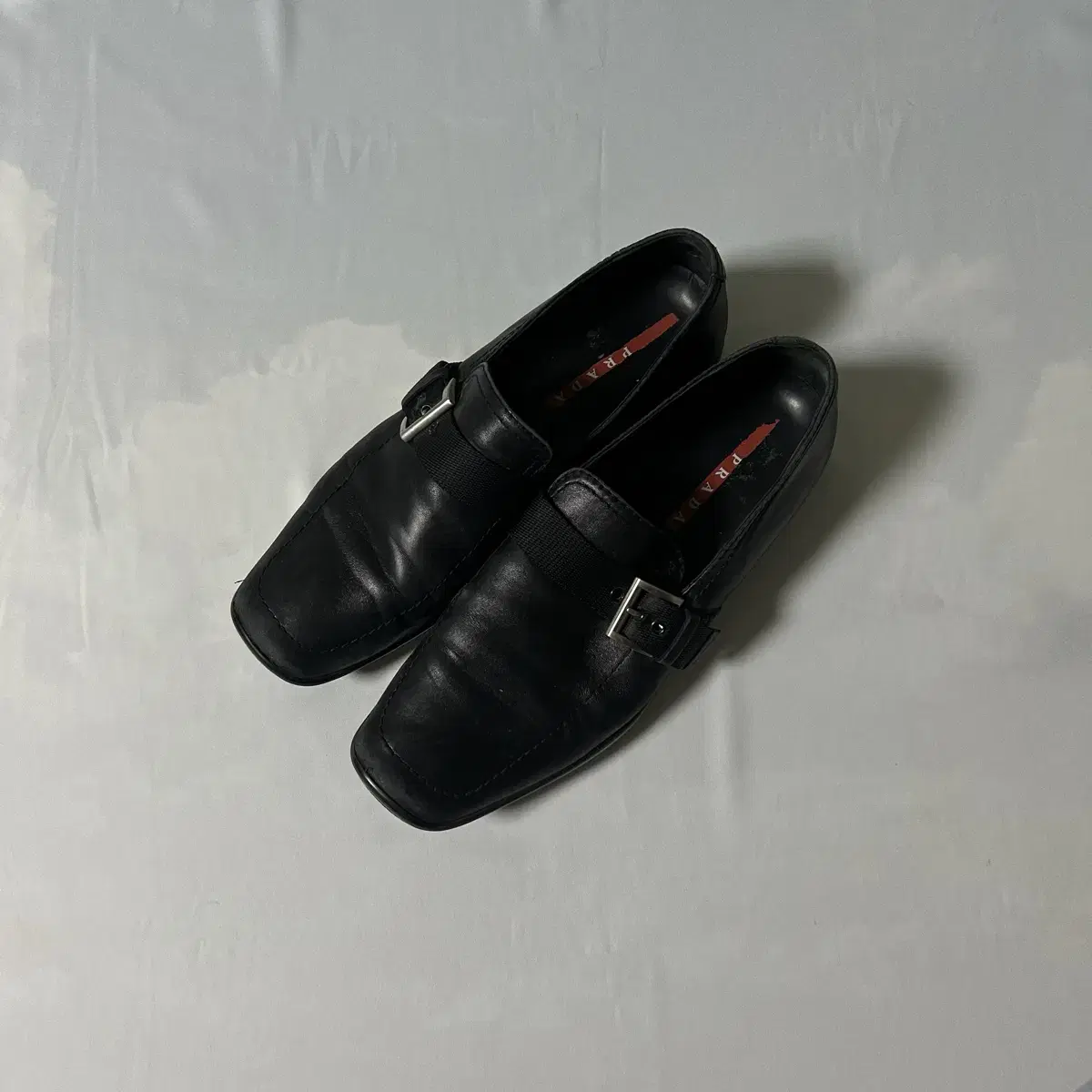 Prada sports buckle strap slipon loafer