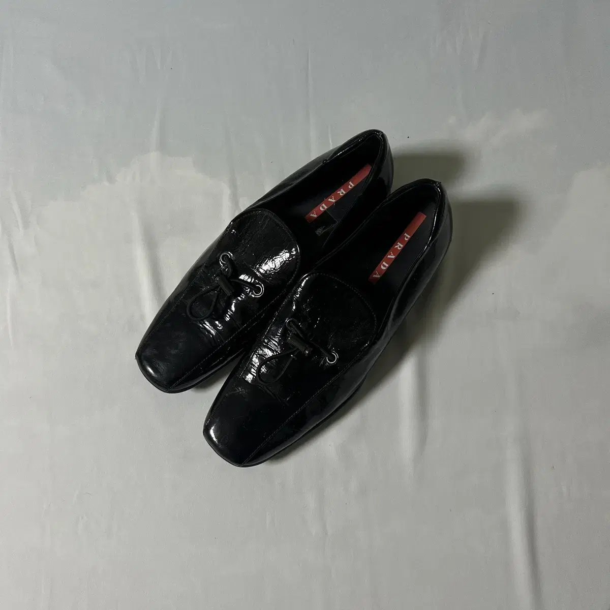 Prada sports toggle slipon loafers