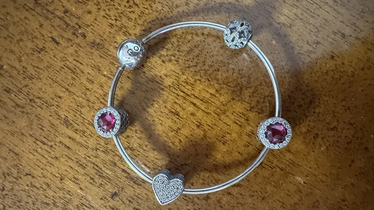 Pandora bracelet (includes 4 charms)