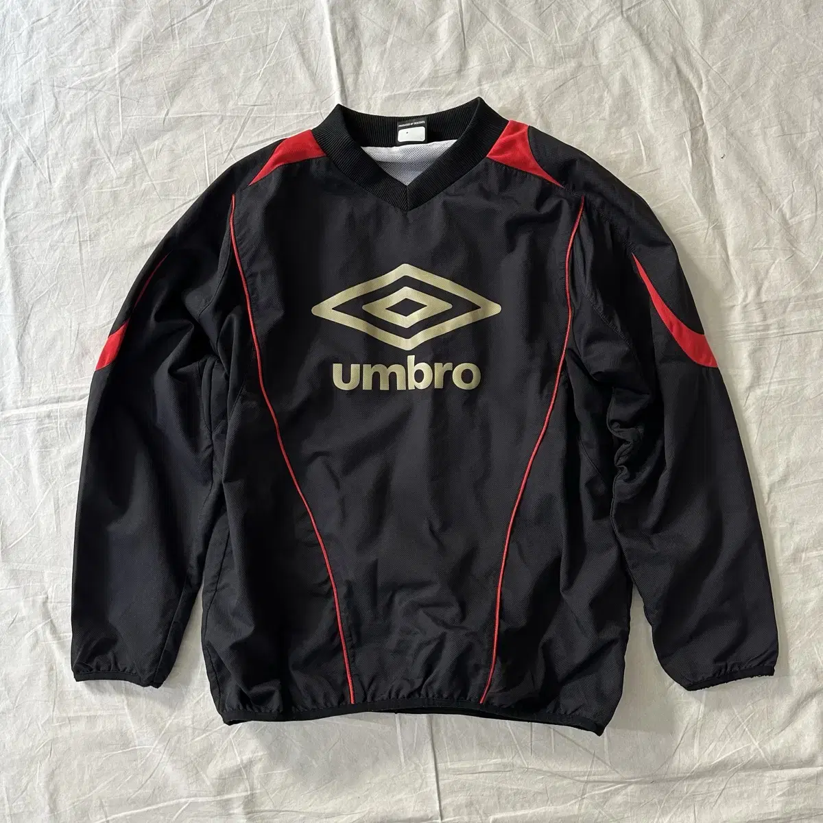 엄브로 umbro 로고 웜업