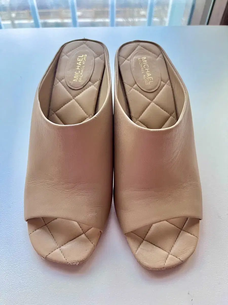 Michael Kors mules are on sale!