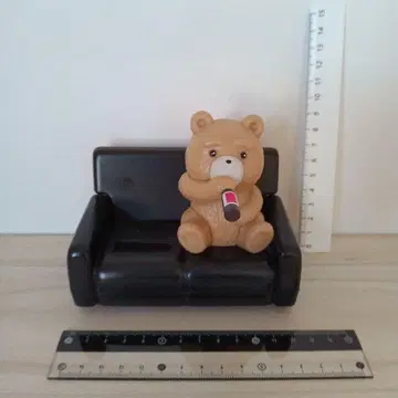 TDE의 목도리 피규어