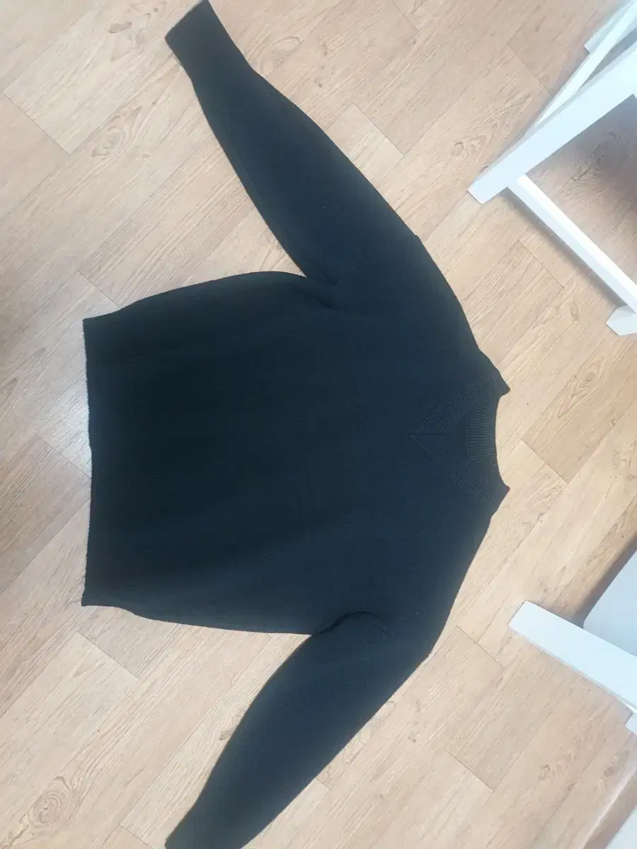 Men's black V-neck knit