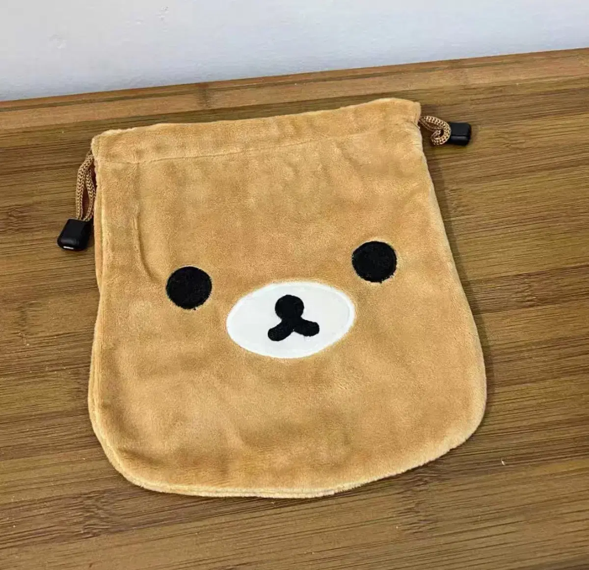 리락쿠마 조리개 파우치