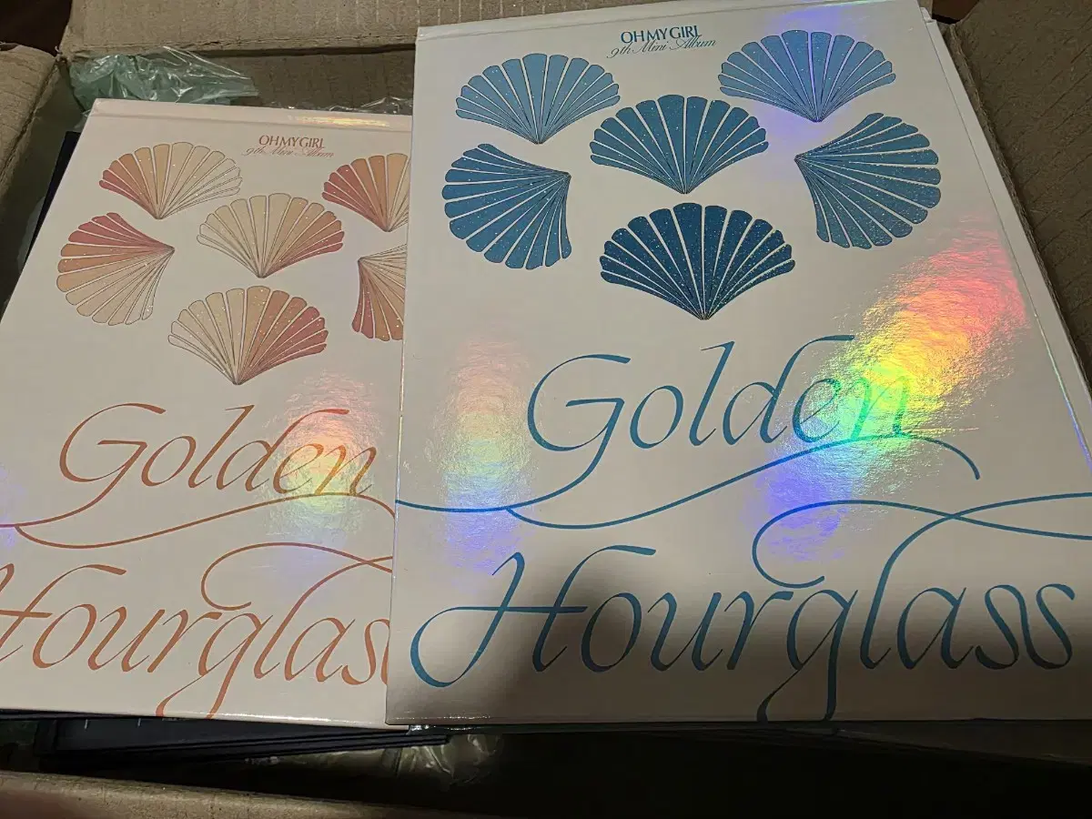 Oh My Girl's 9th and 10th mini-albums are being shared for free