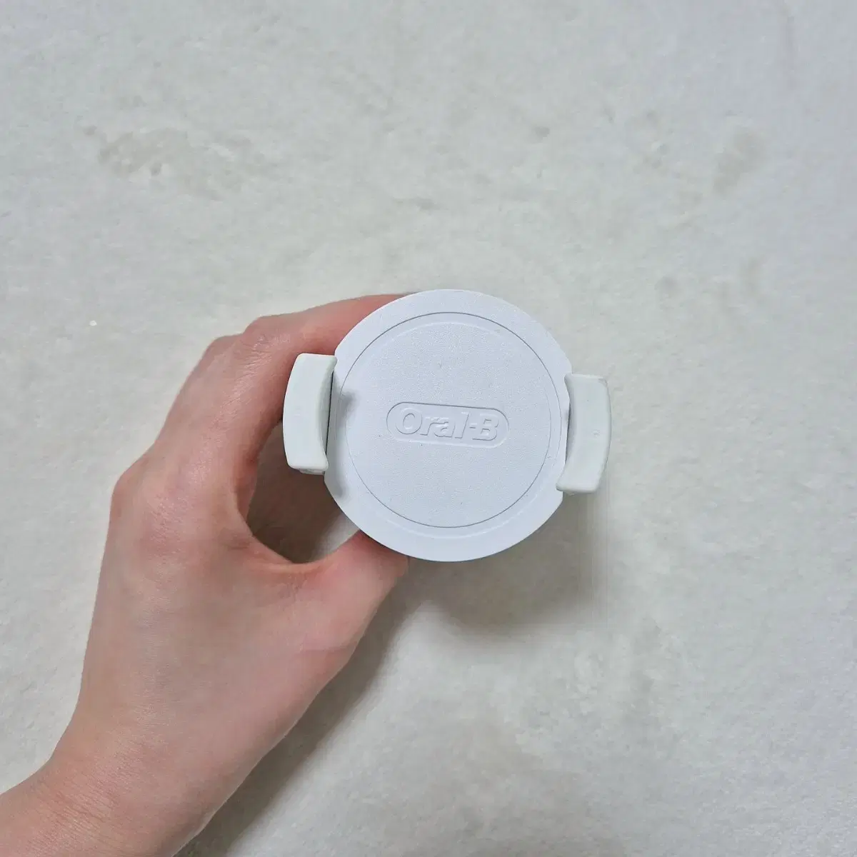 Oral-B mobile phone holder