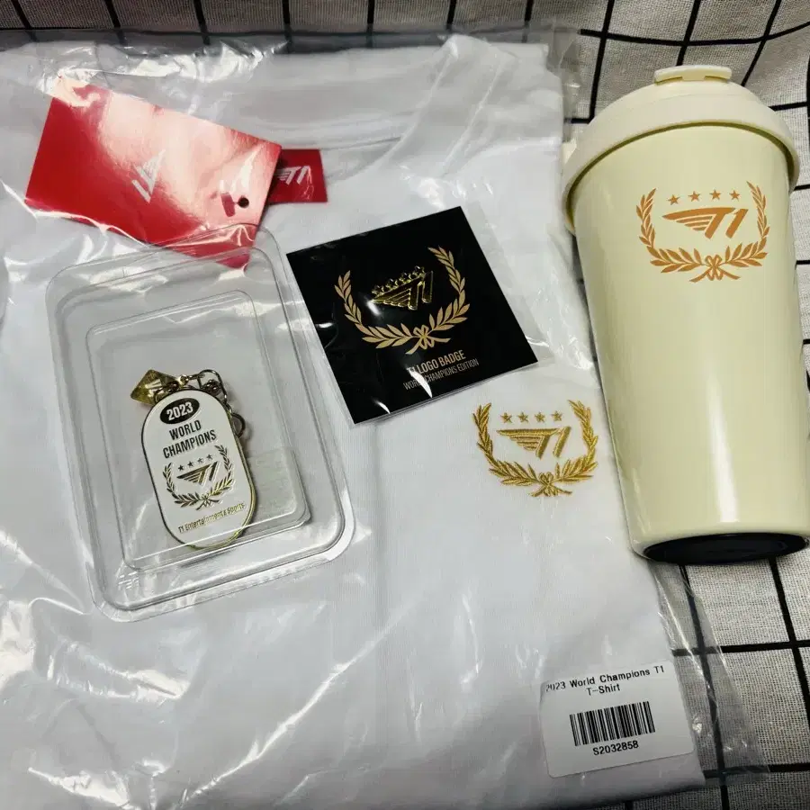 티원23 월즈 우승 굿즈