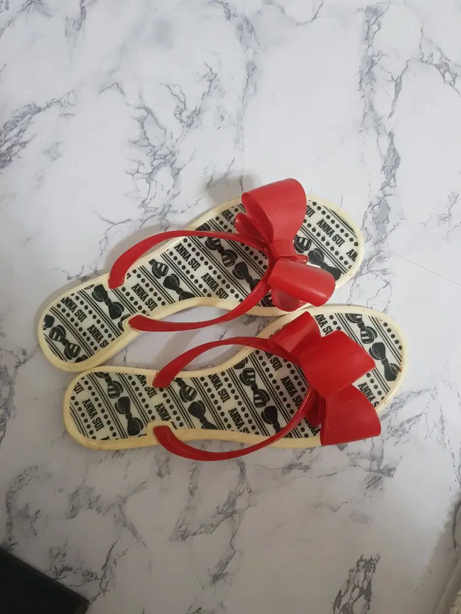 Anna Sui flip-flops