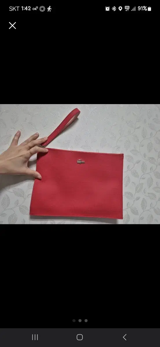 Lacoste clutch bag