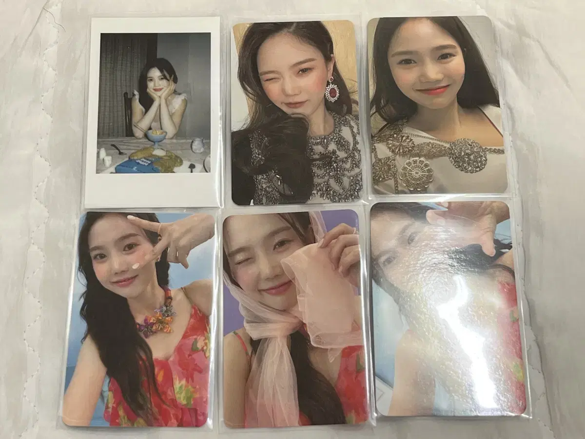 Oh My Girl Season's Greetings, album poca sell Hyojung, Mimi, Yooa, Seunghee, Jiho, Yubin, Arin