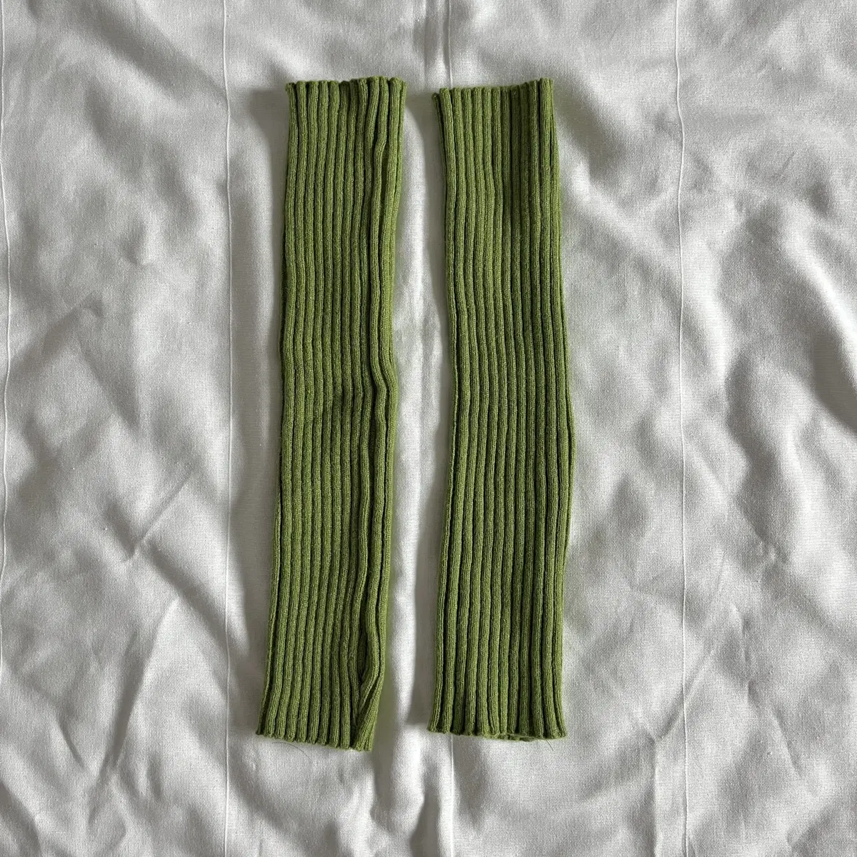 Green knit arm sleeves