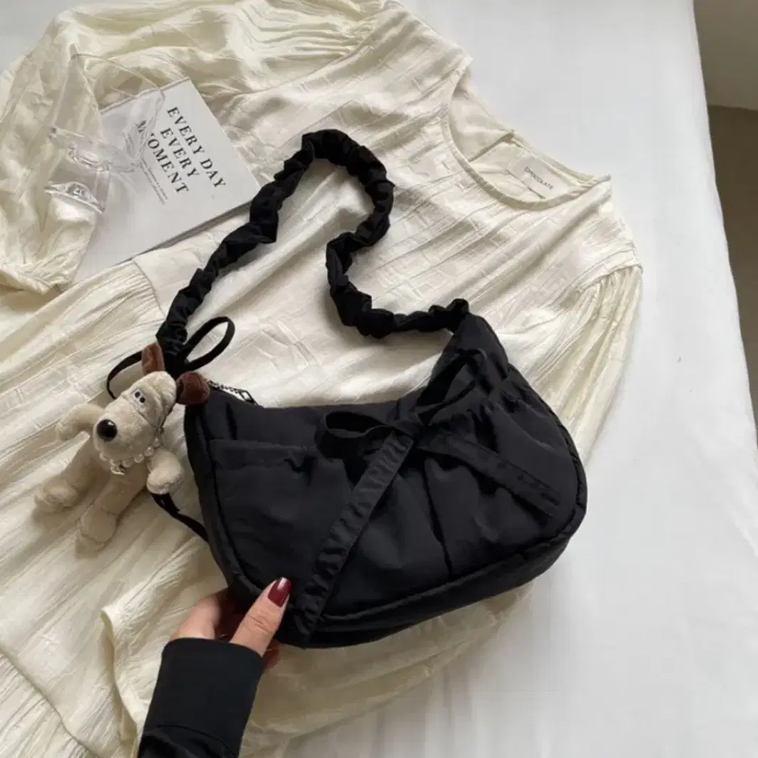 FENNEC RIBBON STRING BAG PEARL IVORY