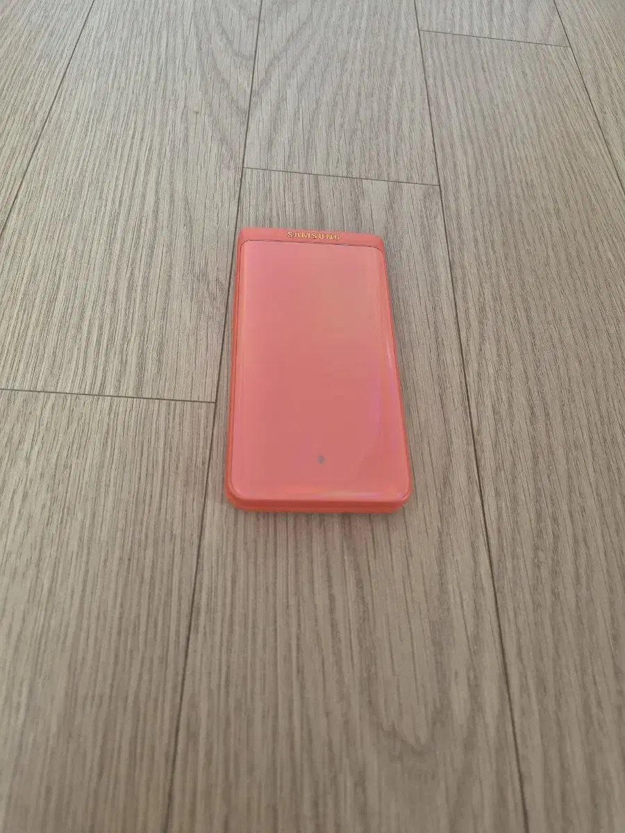 Samsung Smart Folder 2 (SM-G160) 32G, Coral Orange color, for sale at 130,000 won