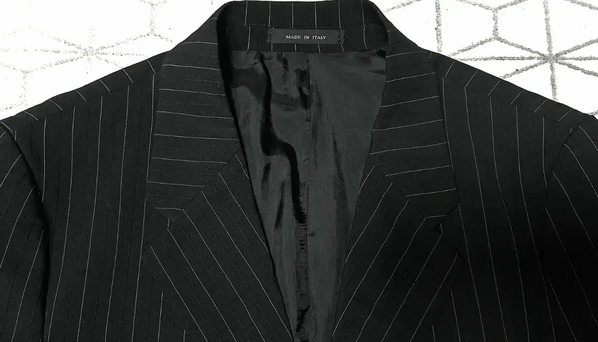 We sell genuine Emporio Armani suits.