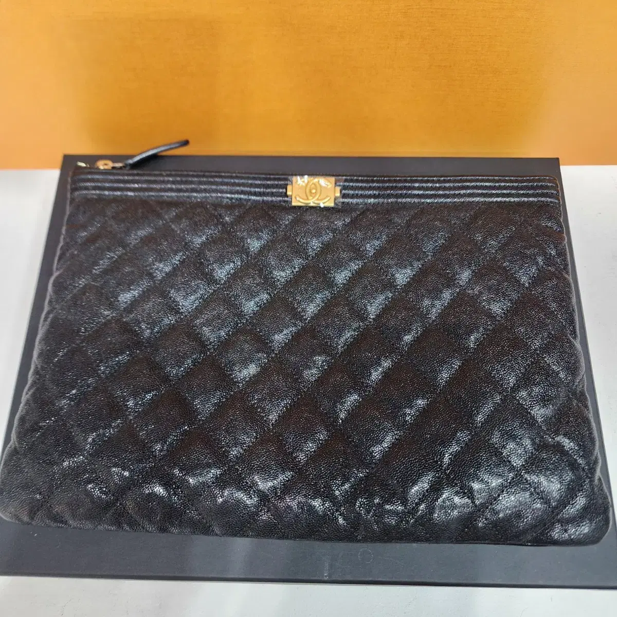 Chanel Boy Clutch Medium Gold-plated Caviar