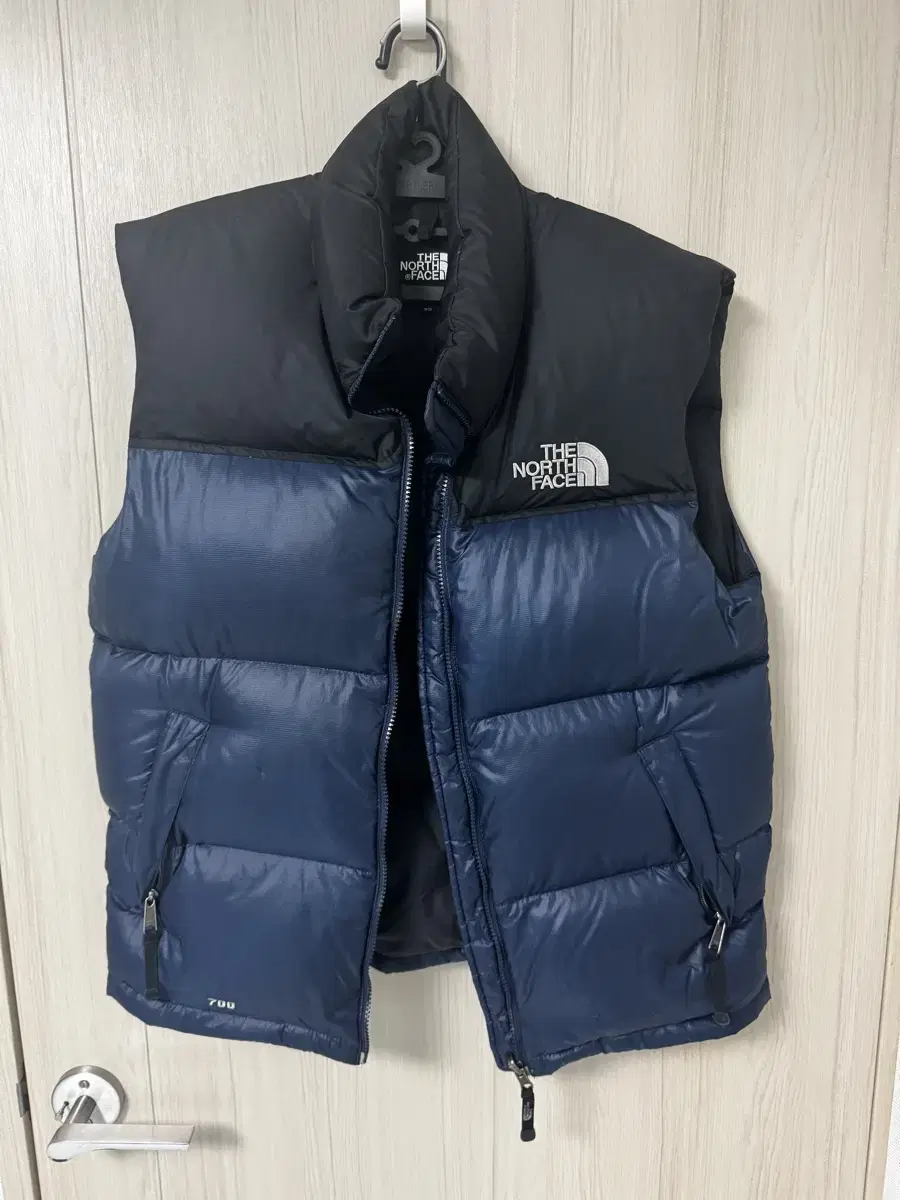노스페이스 패딩조끼